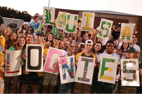 Louisa Loonies are showing their excitement during a 2019 football game. 