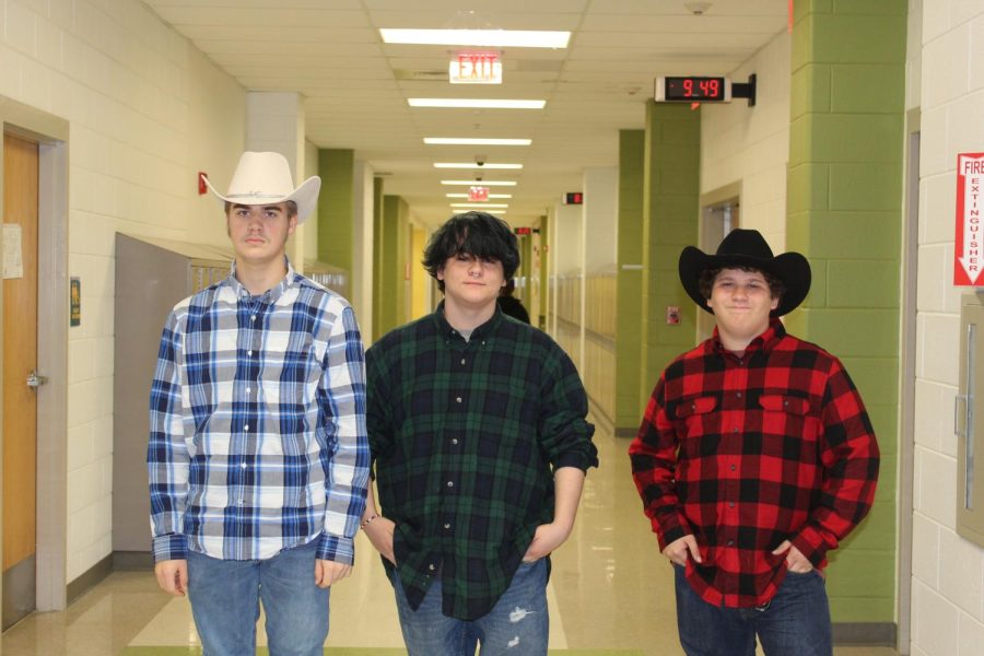 Evan Hataway, Jayson Harrison and Thomas Klein dressed up for the country vs country club spirit day. 
