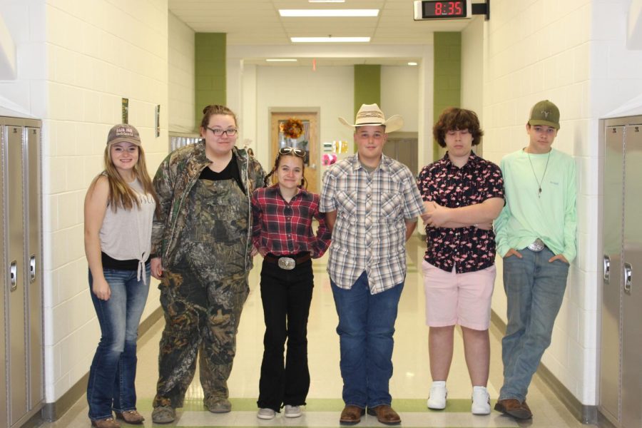 Payton Whitney, Sadie Alvis, Madison Sampson, Arthur Wills, Rocco Hall and Rylee Stokes dressed up for the country vs country club spirit day. 
