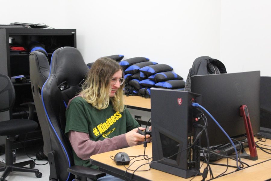 Reporter, Jacob Hodell plays video games in the Esports Lab.