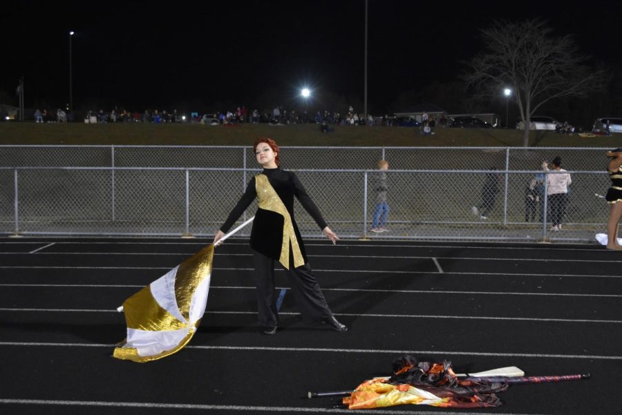 Color guard practicing before halftime.