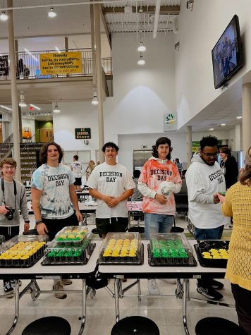 Decision day 2022 when seniors were lined up ready to receive a cupcake in honor of their college decisions. 