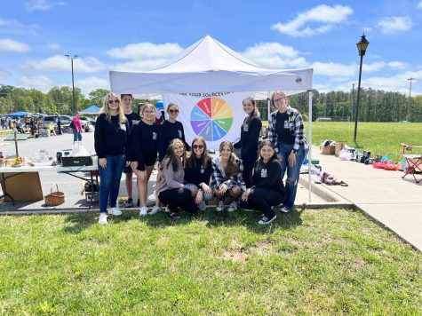 Photo taken by Region 10 Counselor, Ms. Britt featuring the Sources of Strength members posing for a group photo at the Yard Sale.