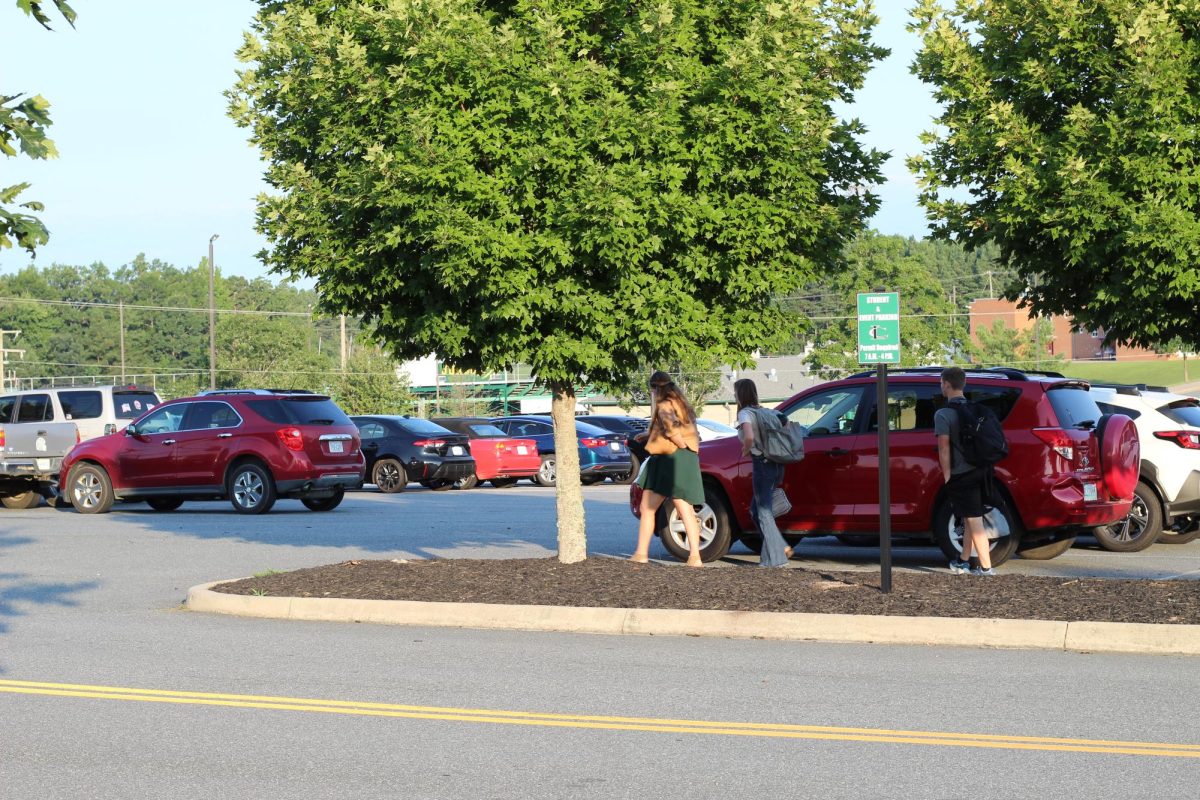 Students arrive with coffee in hand for the first day of school