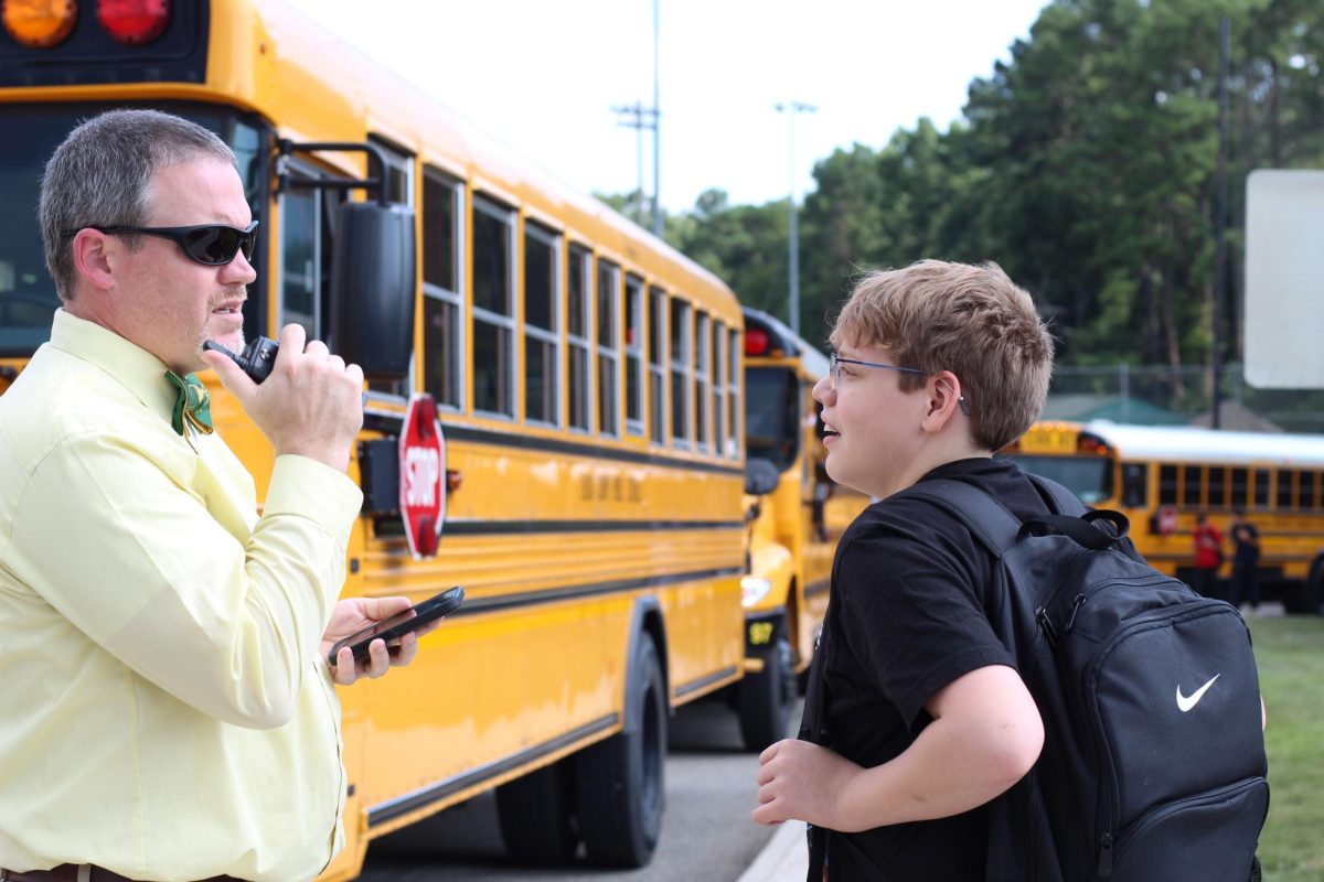 Students receive help with finding their busses to make sure they can go home.