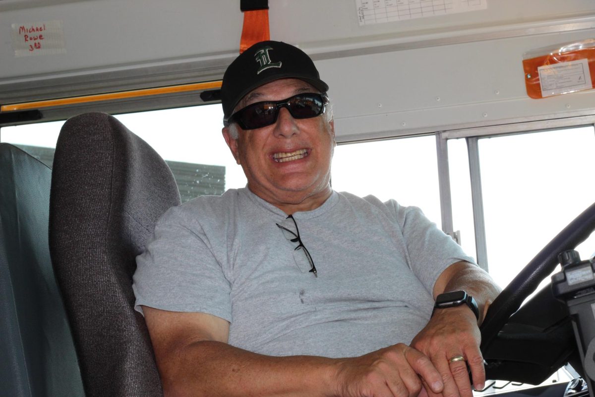 Cheerful, helpful bus drivers safely bring students home after the first day of school