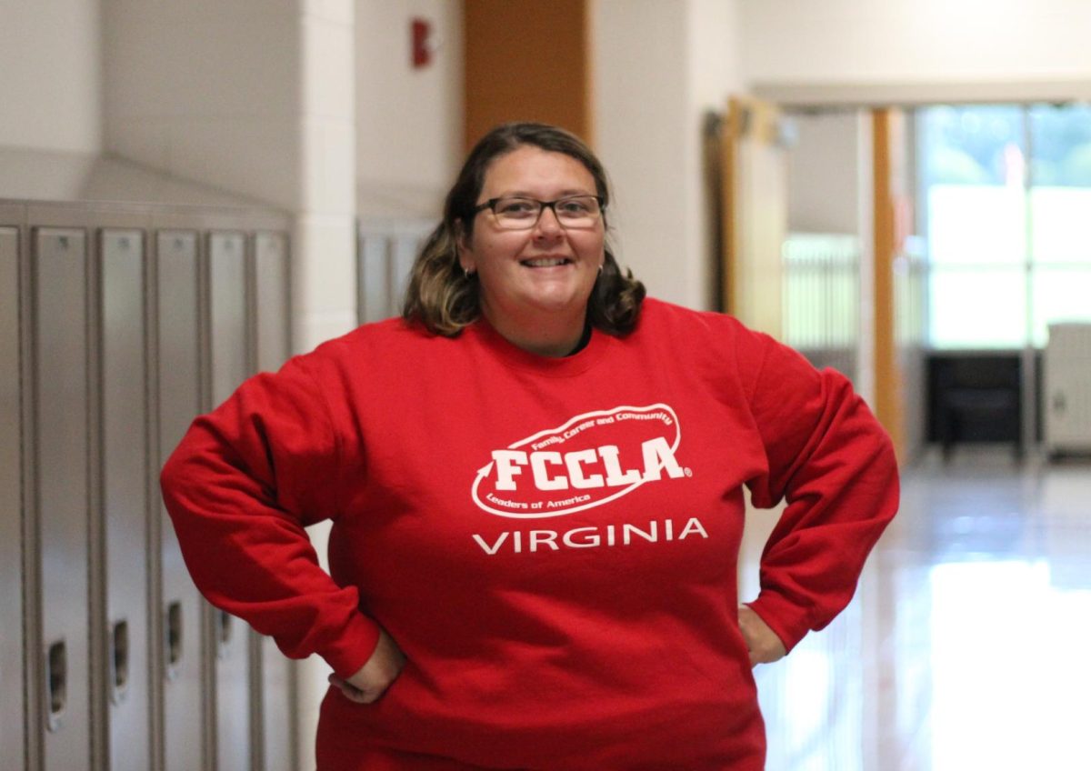 FCCLAs sponsor Nicole Lohr, happy to be showing her FCCLA apparel while she teaches her first period class.