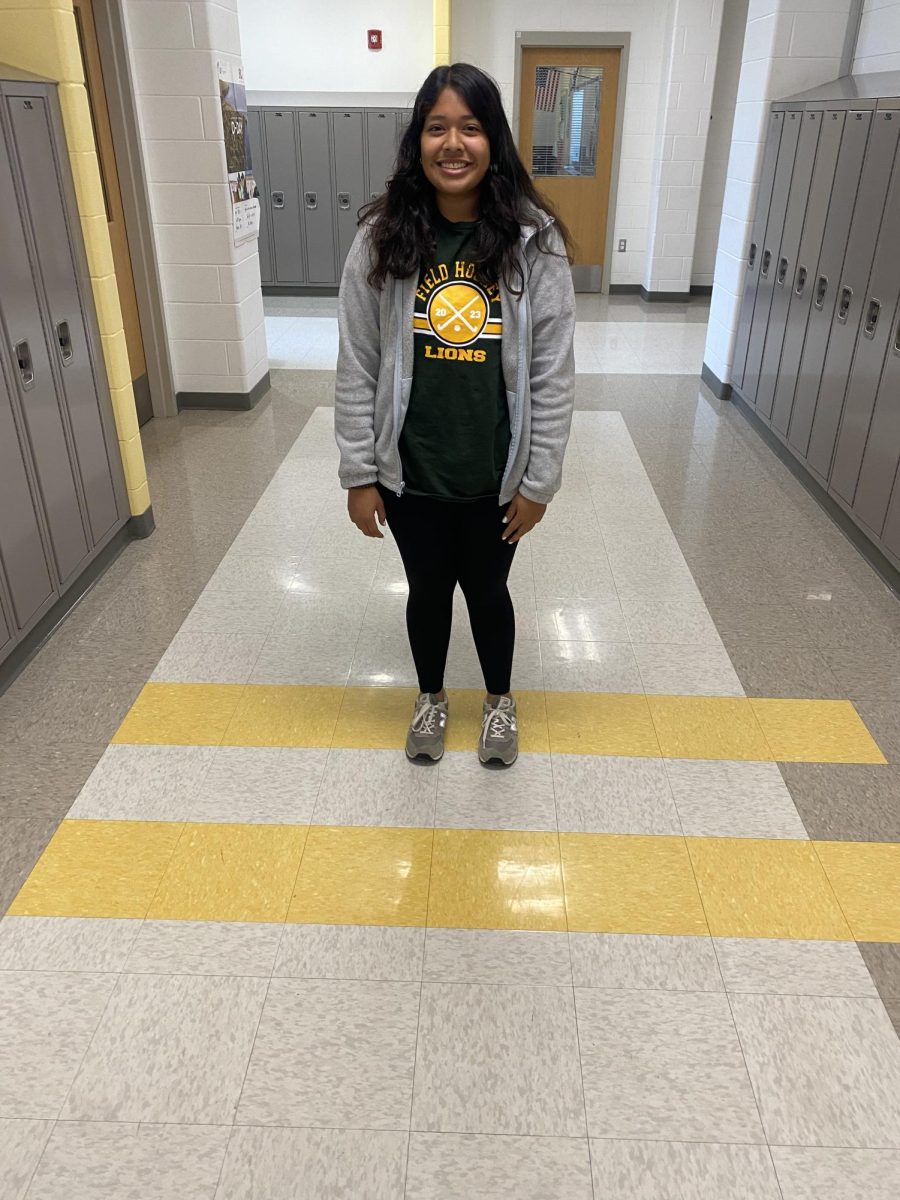 Vanessa Ramirez stands with her field hockey apparel as they have a game this day.