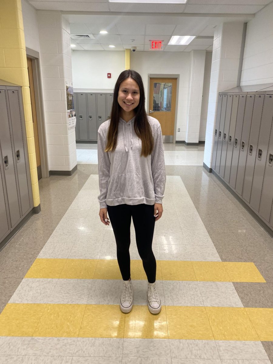 Laurelei Choi varsity field hockey player stopped in the hall to take a picture.