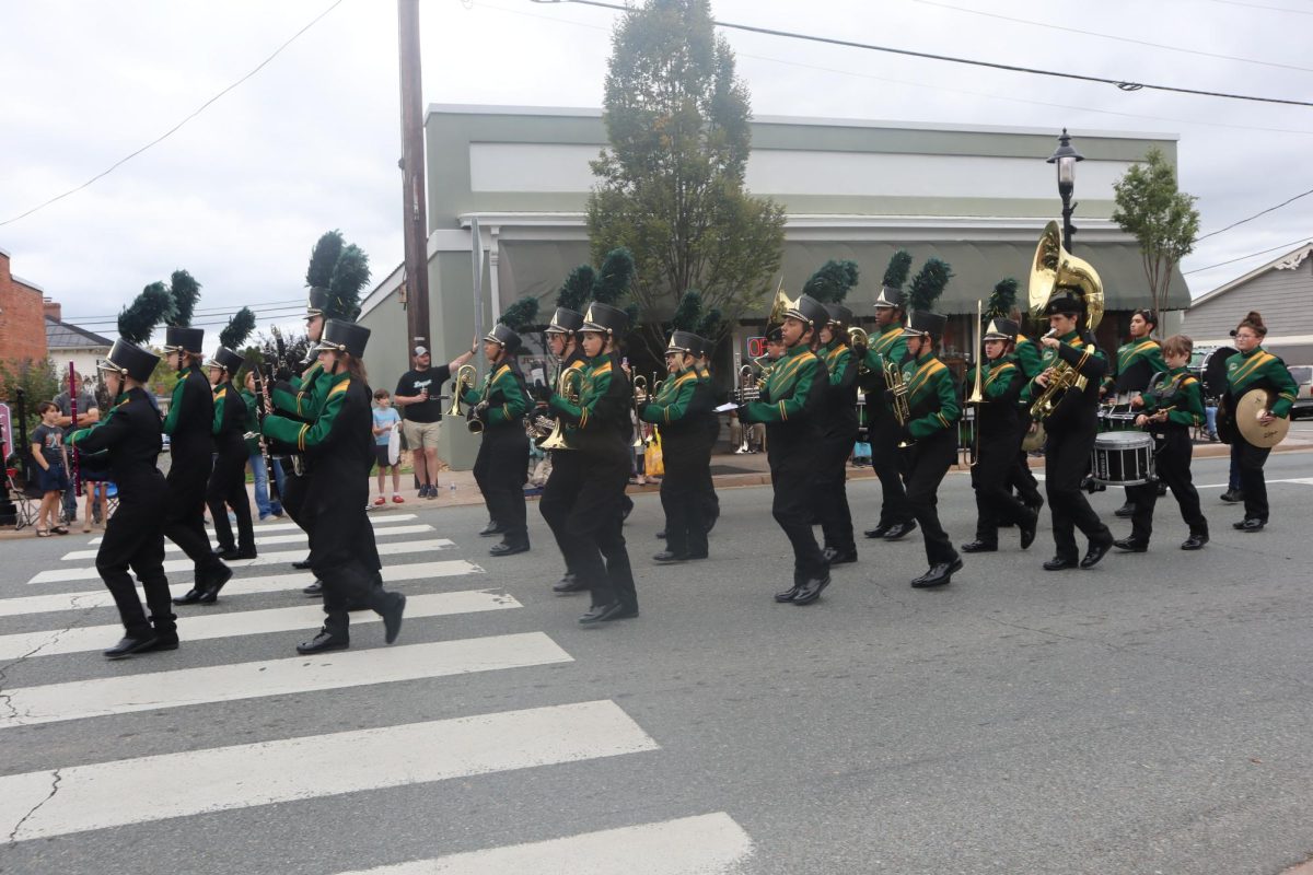 The LCHS high school band play the county fight song in the beginning of the parade. 