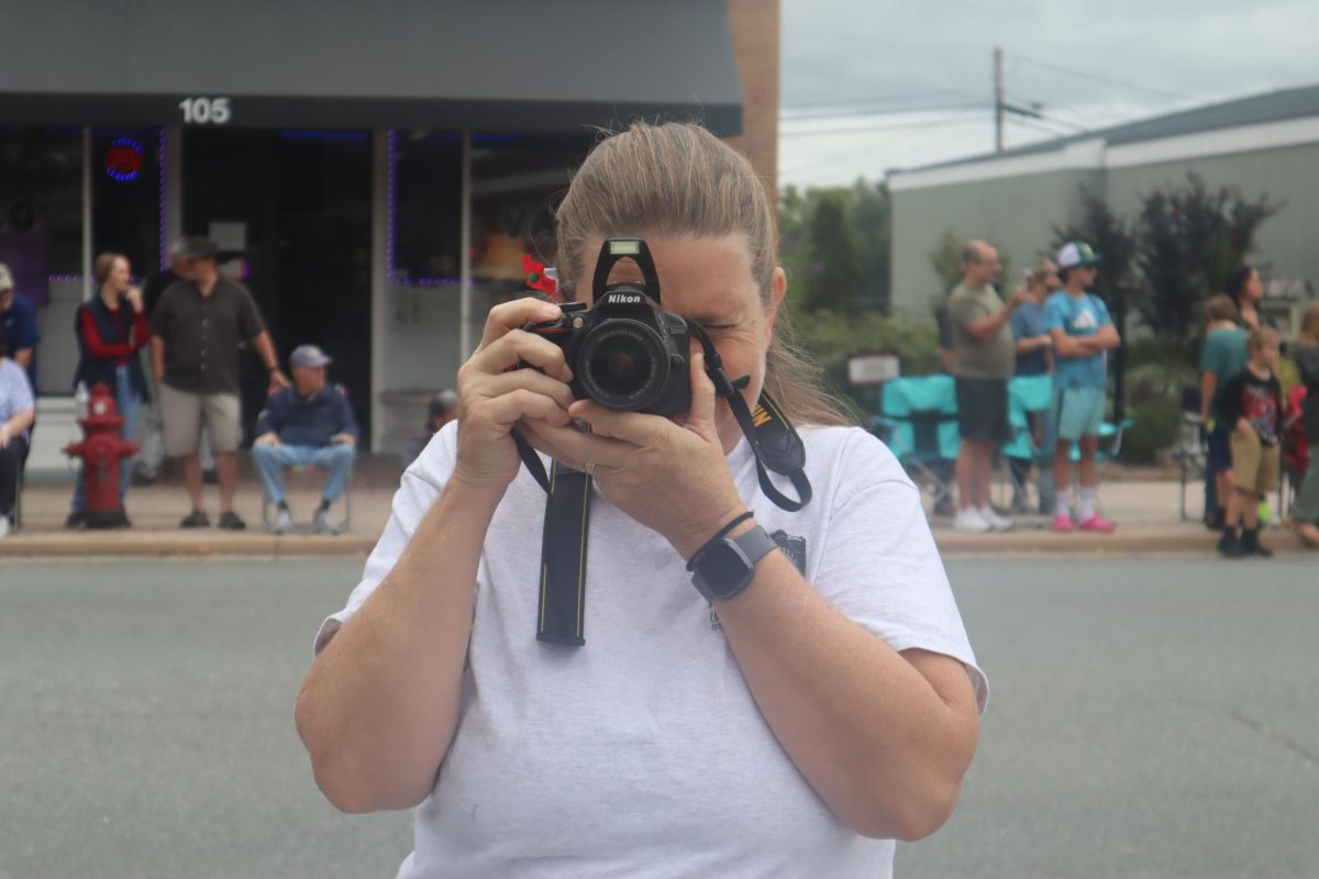LCHS Newspaper editor and English teacher Heather Curran and I exchange photos as we both photograph the parade.