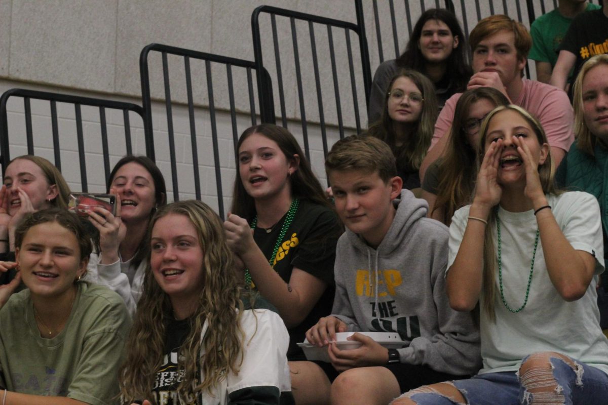 Juniors student section cheering on their friends during the pep-rally games.