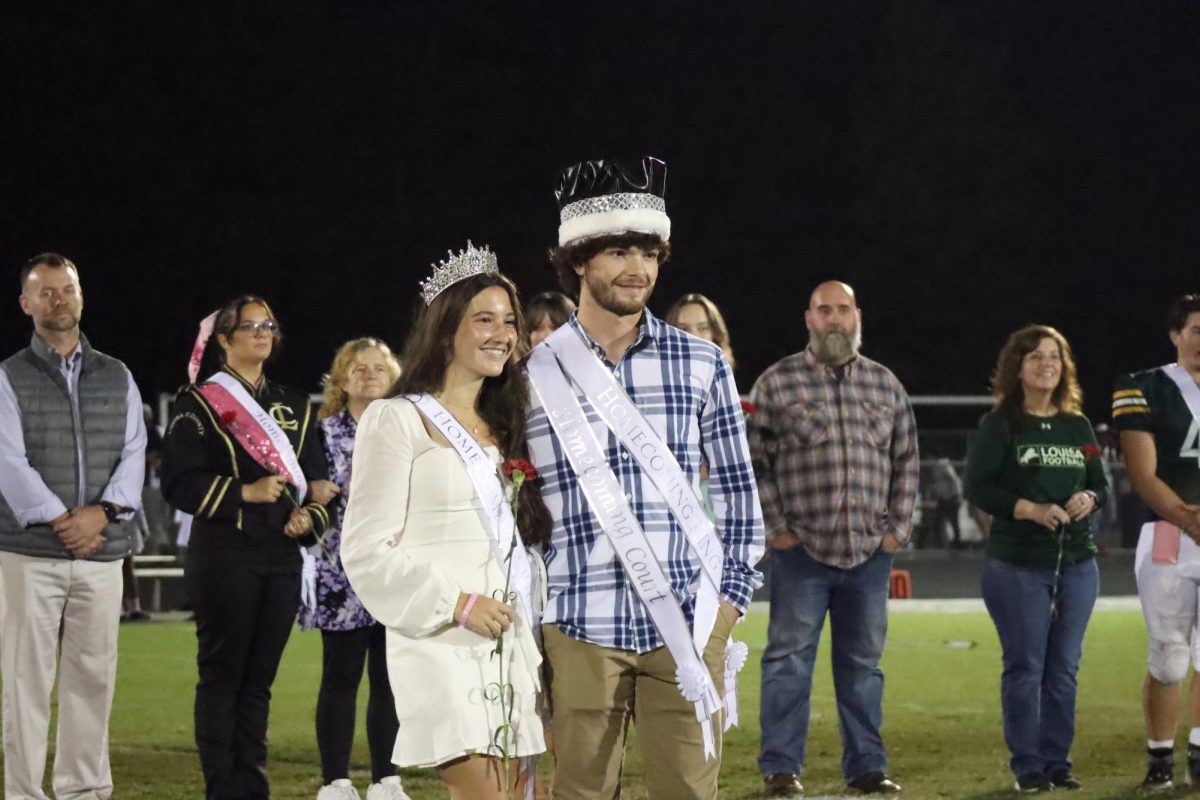 2023 Homecoming queen Angelina Barrientos and king Daniel Harlow standing together after being crowned during halftime