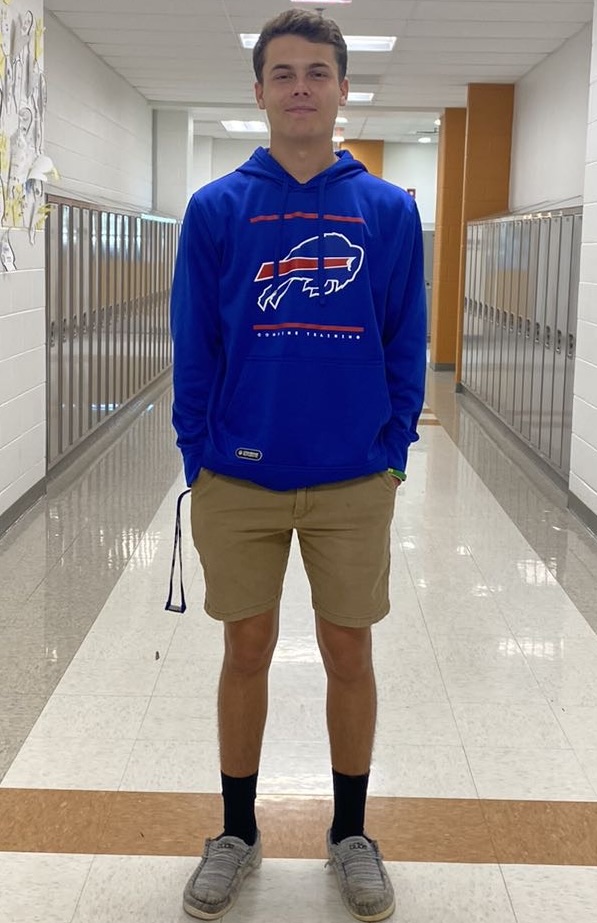 Connor Downey Poses for a picture in his Buffalo Bills sweatshirt.