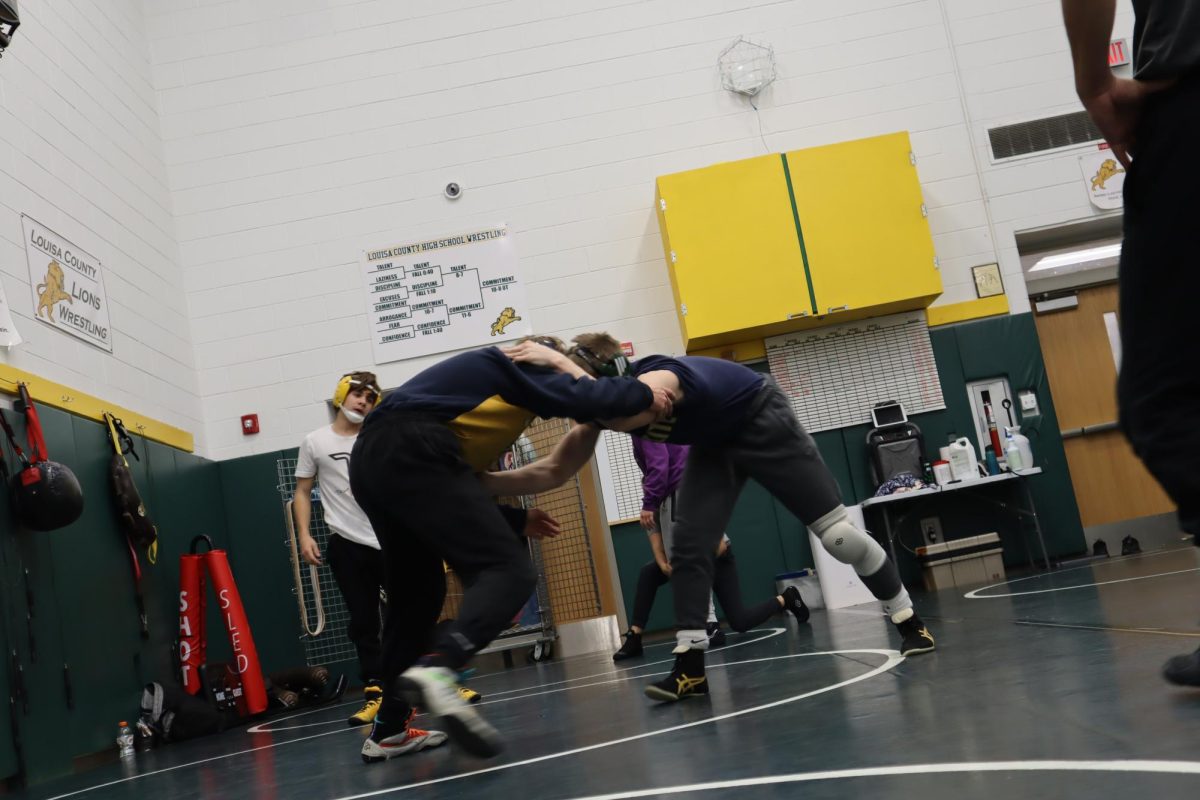Two+wrestlers+go+at+it+in+an+intense+practice.+%28Photo+from+Harbor+Amiss%29