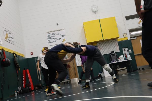 Two wrestlers go at it in an intense practice. (Photo from Harbor Amiss)
