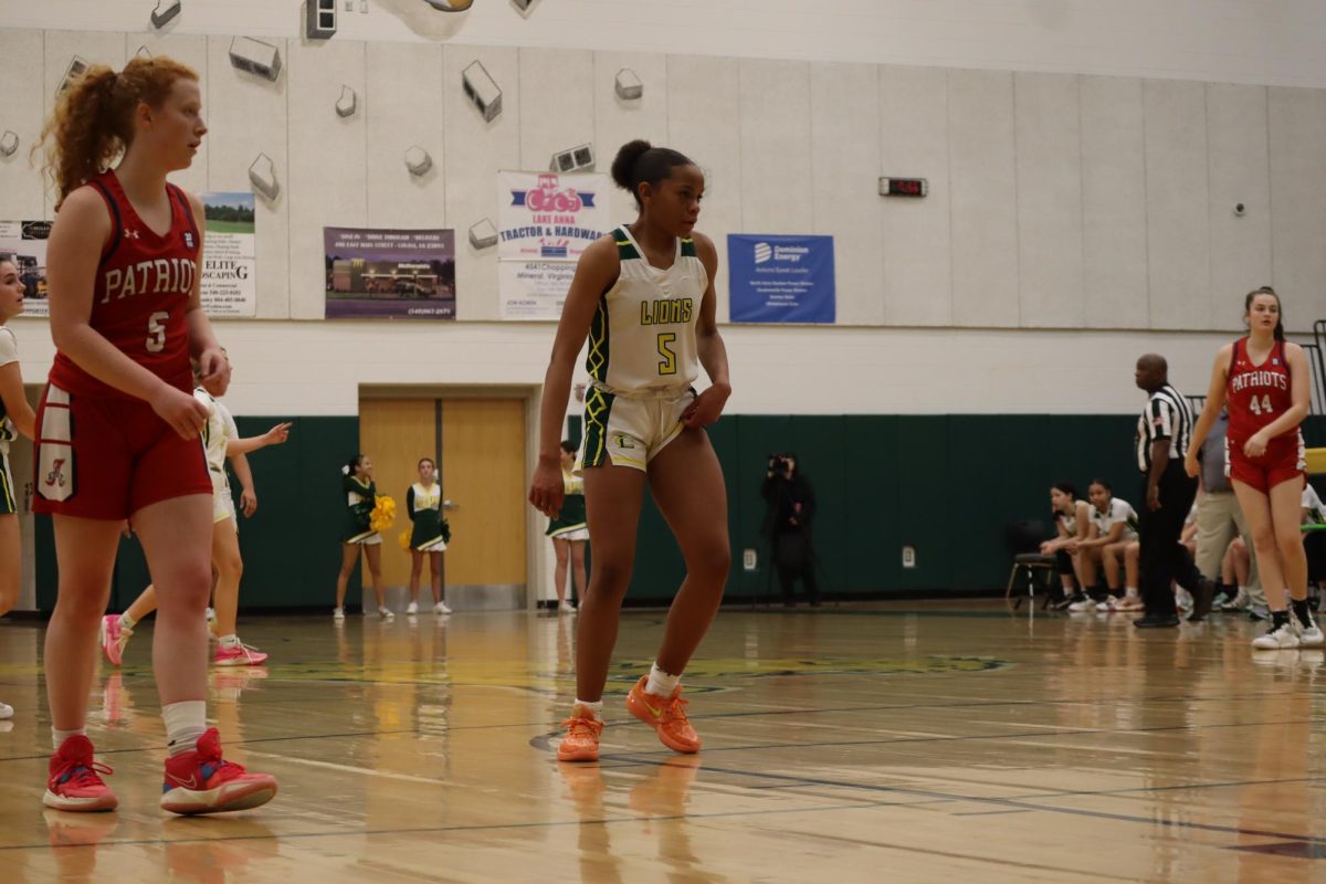 Sophomore Makayla Vest-Sims pulls up her shorts to get ready to lock someone down on defence. 