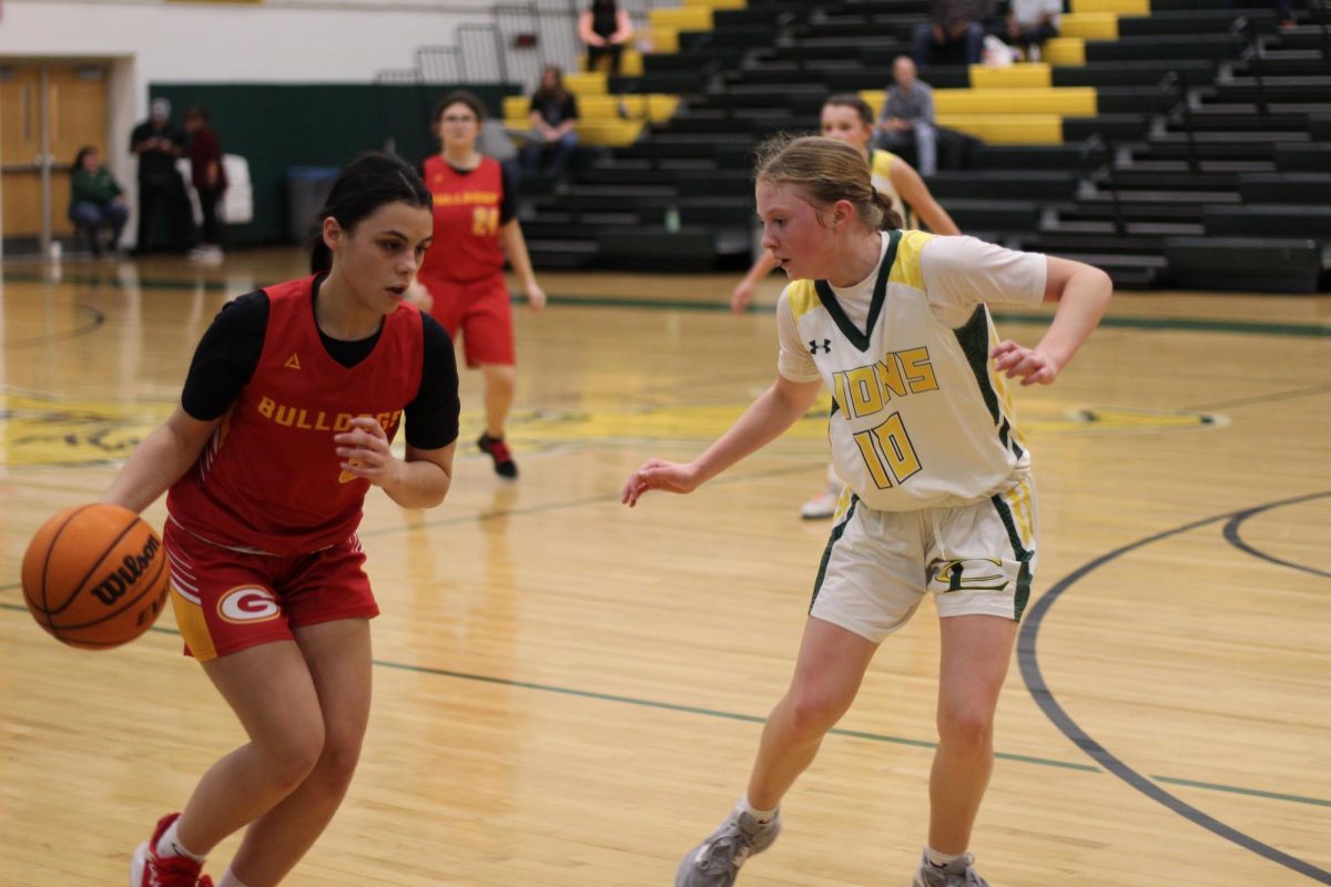 Katelyn Cheely, Number 10, defends an opposing player. 