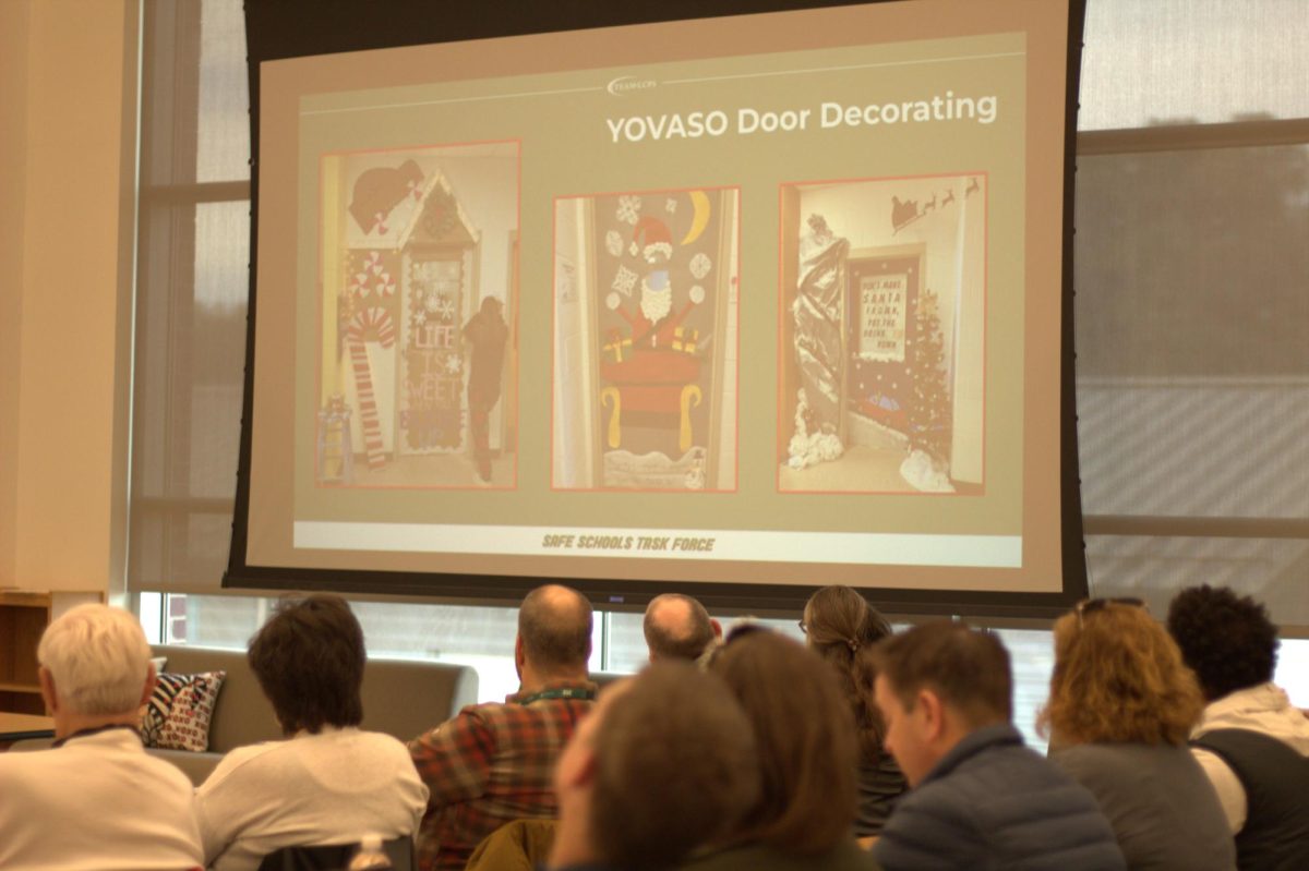 Presentation showing YOVASO door decorating campaign to promote safe driving. 
