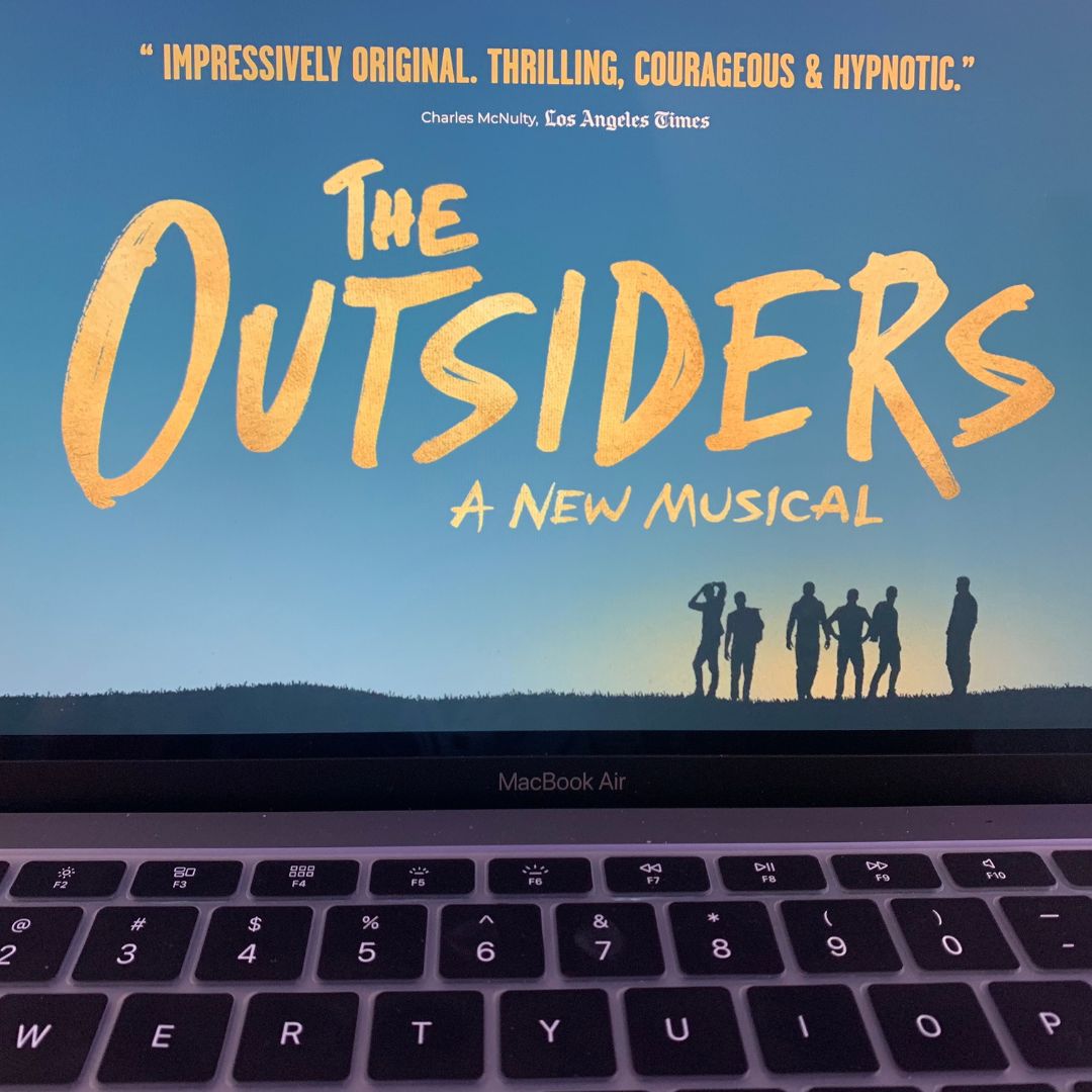 The opening page of the official "The Outsiders: A New Musical" website.