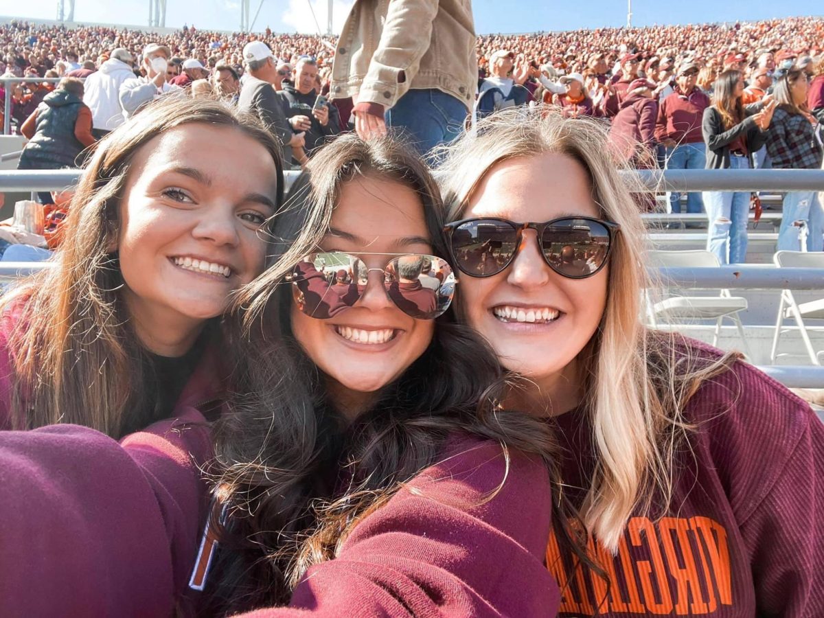 Keira Apple, my sister (Courtney Sargent), and I at a Virginia Tech football game.