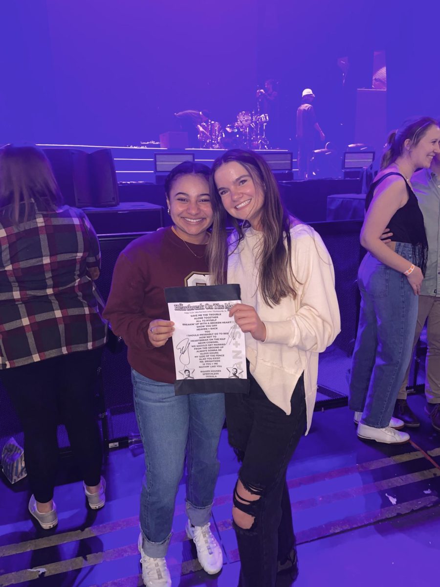 Danielle Scott and I in the pit of a Dan and Shay concert at the John Paul Jones Arena in Charlottesville.