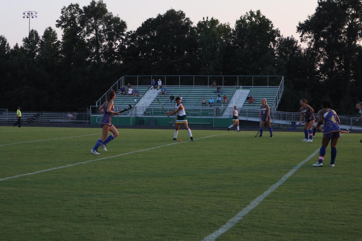 Senior Nyah Straley prepares to pass the ball across the field to a teammate.
