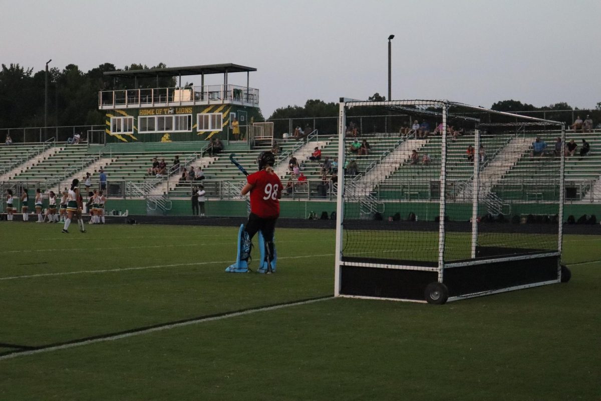 Keeper, Taylor Waddy stands ready to defend Louisa's goal from the King George athletes.
