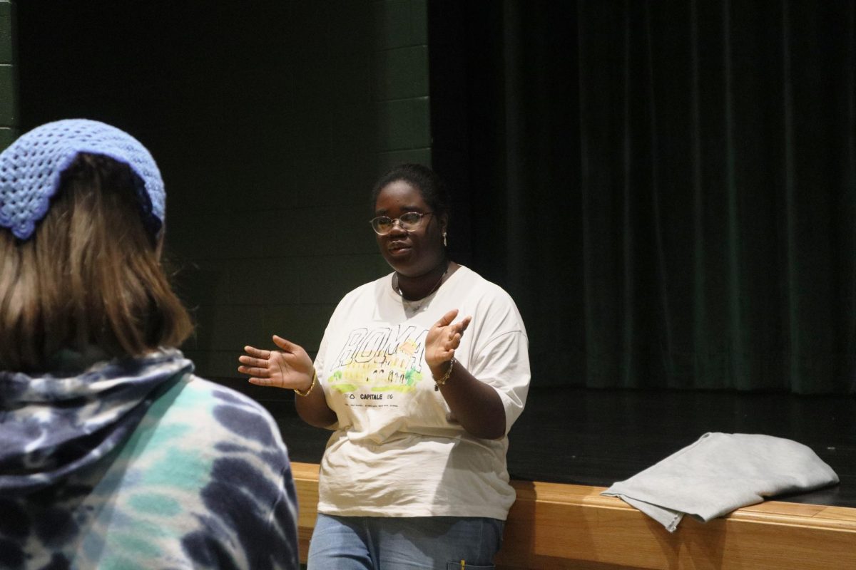 Tryphena Alaribe explains to classmates about her running for treasurer