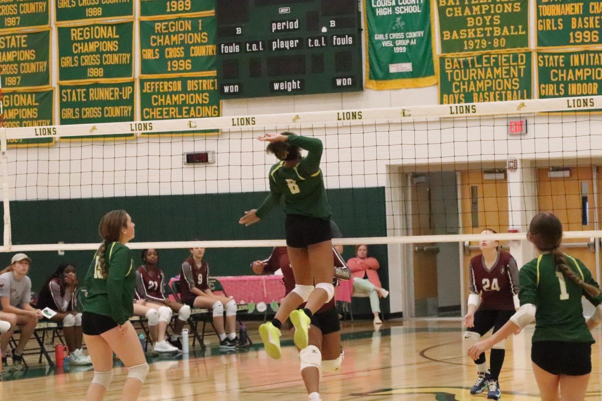 Sophomore Ciara Butler is spiking the ball back to the otherside of the net.