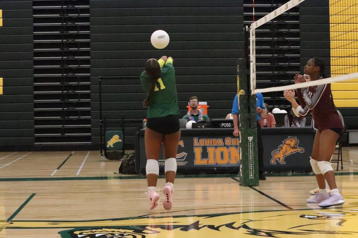 Freshman Jada Green bumps the ball in preparation to hit it over the net.