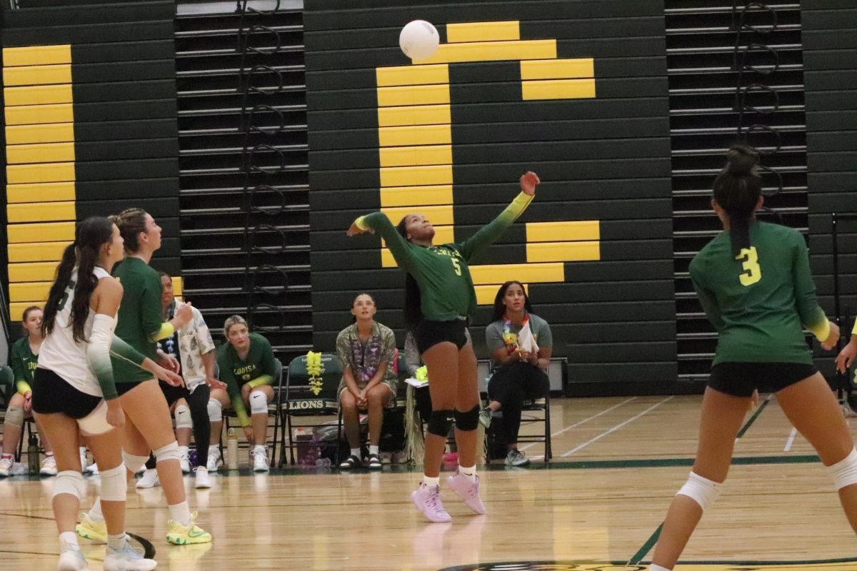 Makayla Vest-Sims about to spike the ball to her opponents. 