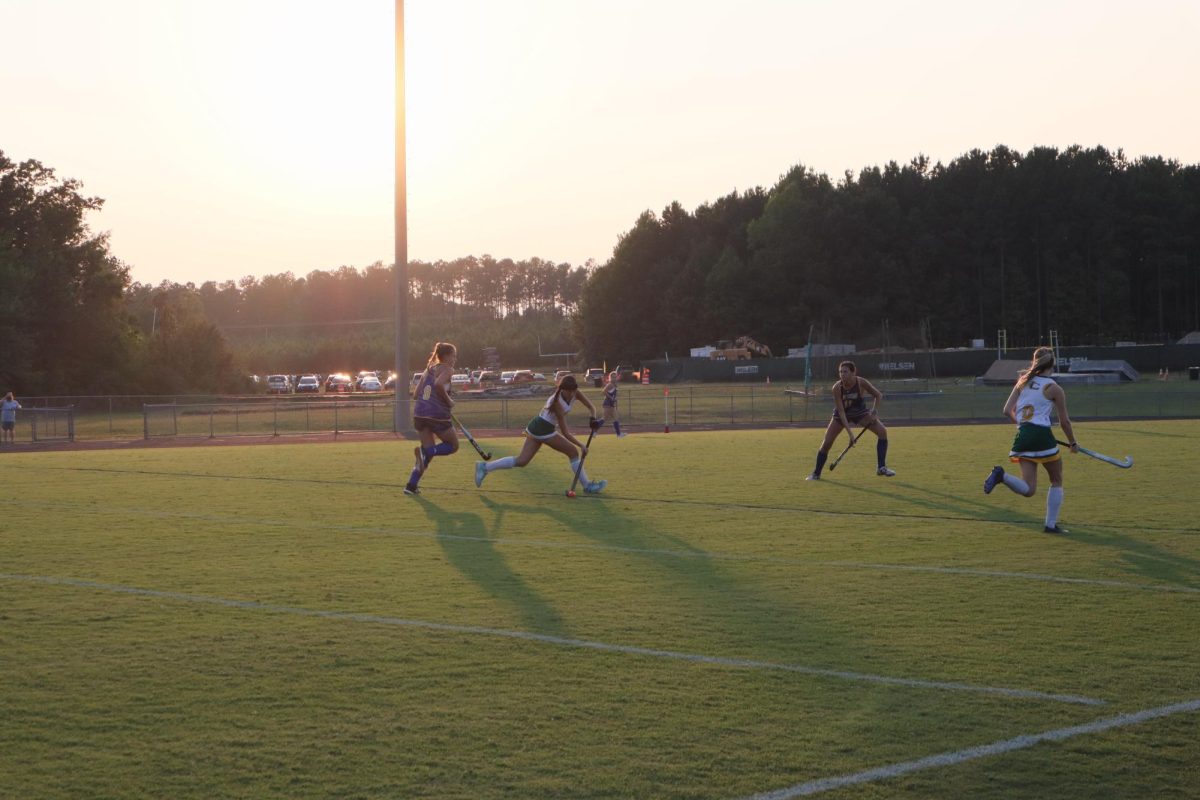 Varsity player Laurelei Choi prepares to pass the ball to one of her teammates.