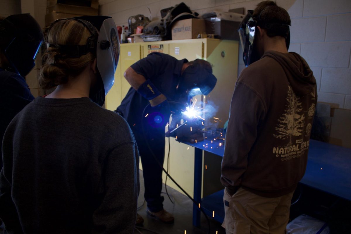 Mr. Galanti teaches his Auto 1 students how to MIG weld.
