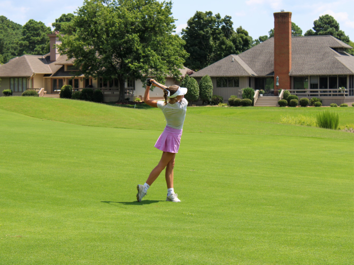 Junior Ava Garrison in her back swing at an individual tournament. Photo taken by her mom