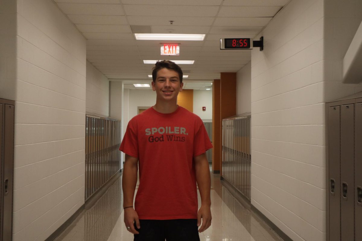 Senior Stephen Rowan, who prefers the two semester schedule, standing in the hallway outside of his first period class.