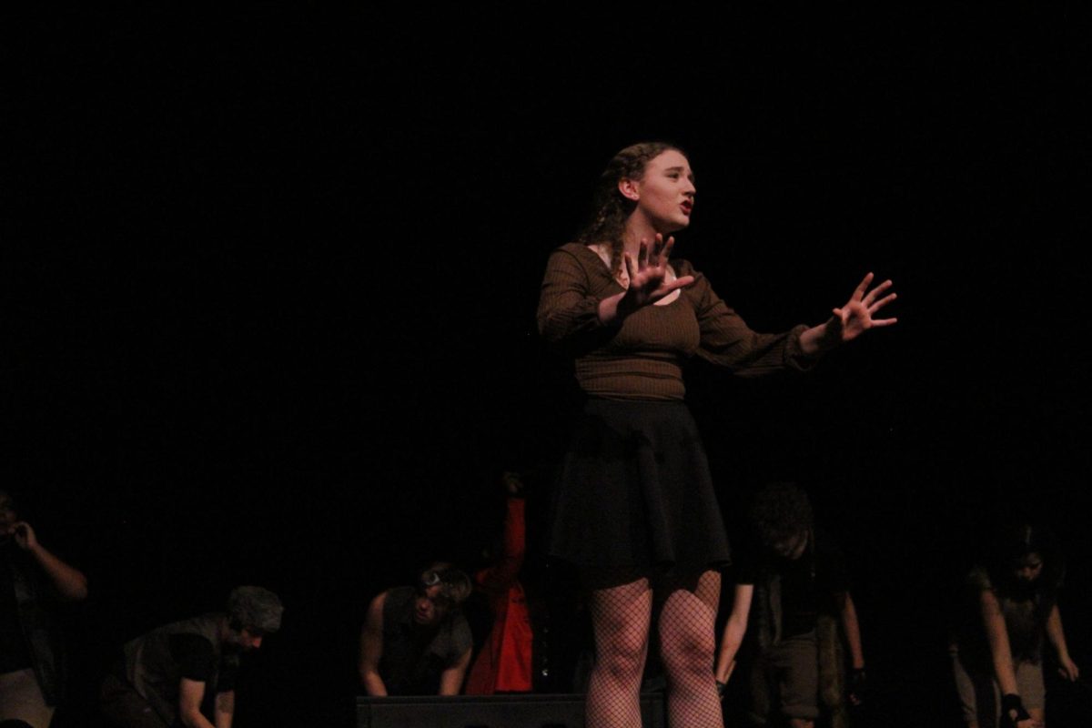 Lily Hubler performing a monologue during Peter Pan.