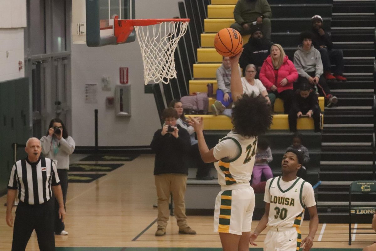 Post player Ty Tison goes up for right-handed floater with no defender around him.