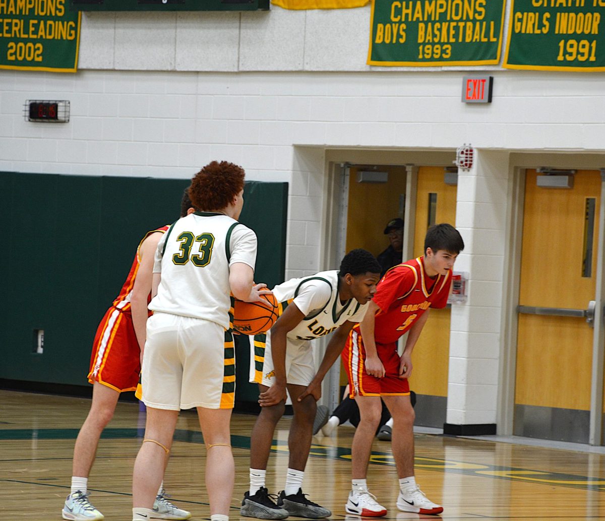 Junior, Micheal Taylor sets up for his first free throw.
