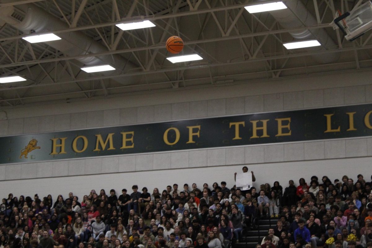 Louisa shoots a last second shot against the Monticello defense before the quarter ends. 
