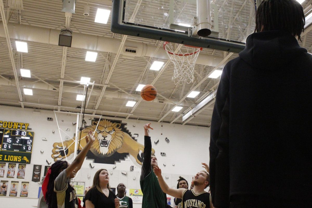 Louisa goes for a finger roll layup against Monticello.
