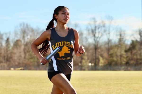 Senior Nyah Straley, a leg of the 4x800m track race. 
