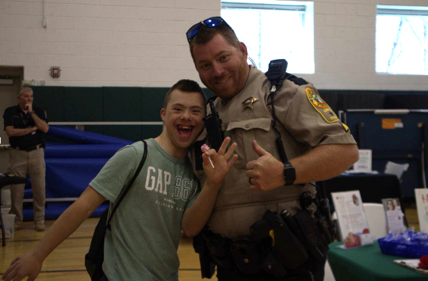 Malachi Rodgers asked Officer Harris to pose with him for a picture.
