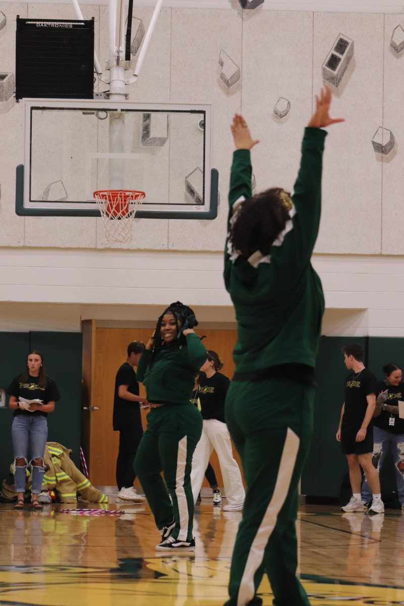 Kalile Shelton and Odessa Johnson, captains of the Step Team, perform their routine.