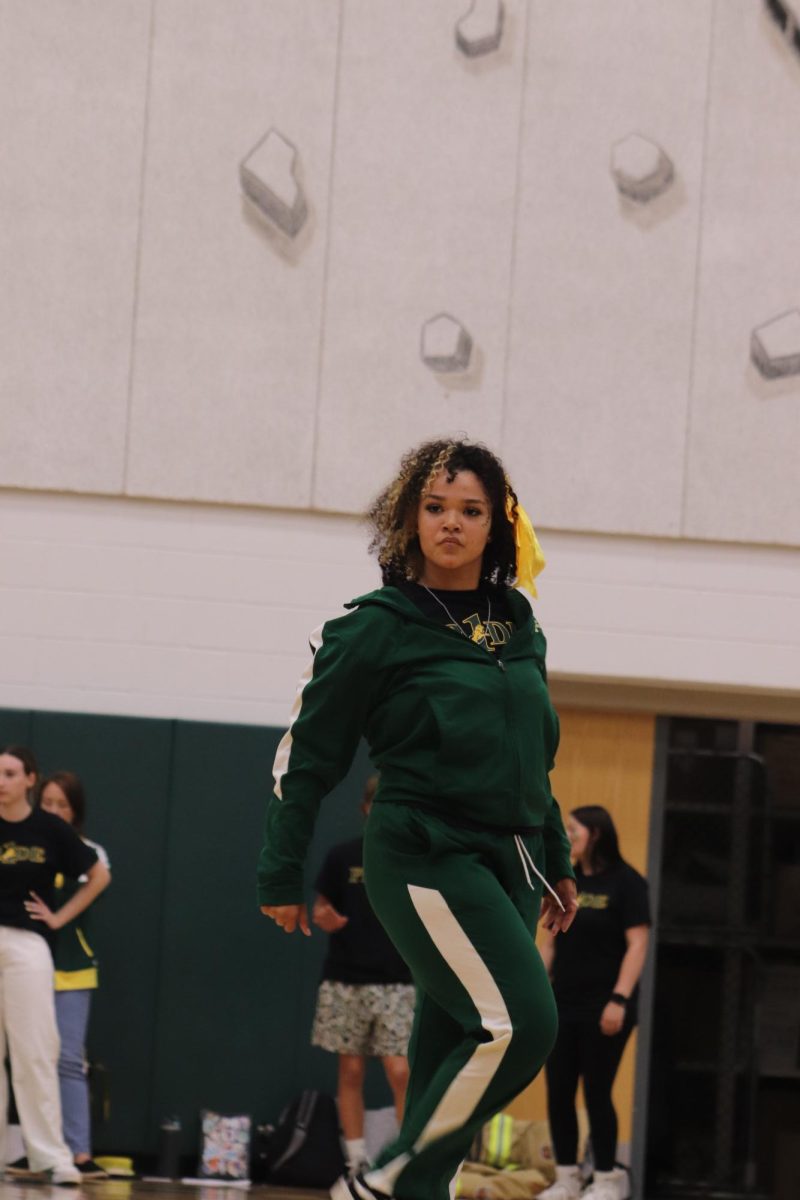 Johnson, in the middle of her routine, poses for a moment to emphasize the dance.
