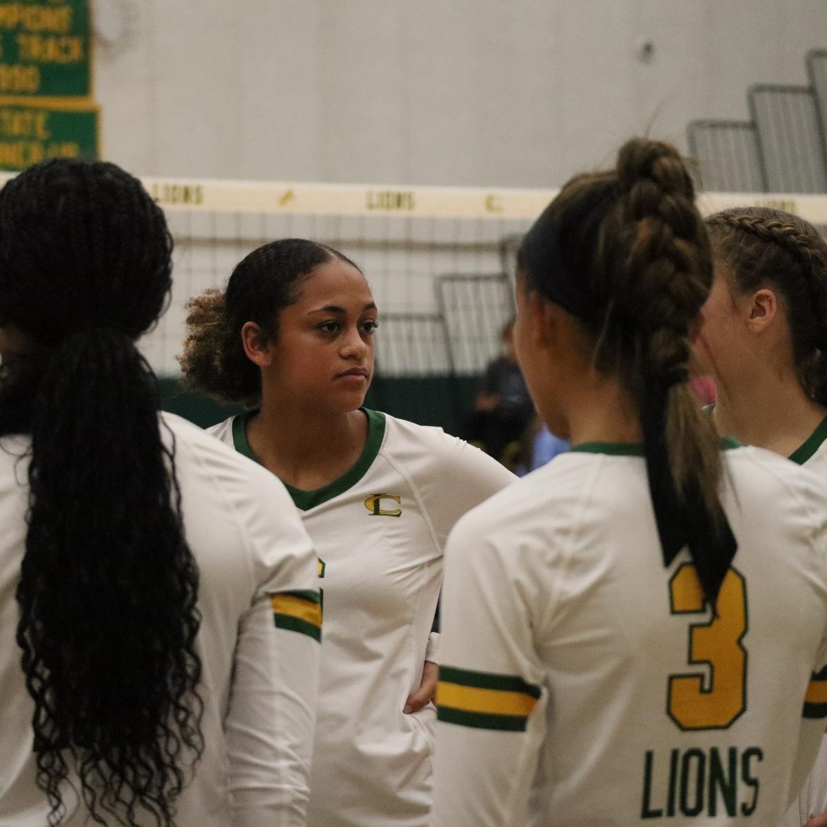 Junior Ciara Butler listens to her coach during a timeout. 