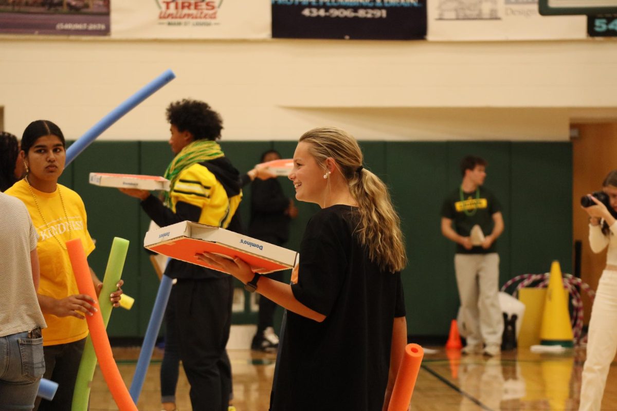 Junior Emery Jones waits for the pizza box game to begin. 