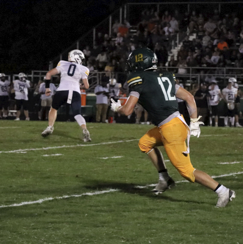 Junior Carson Lonce runs down the field to try and get open for a pass.
