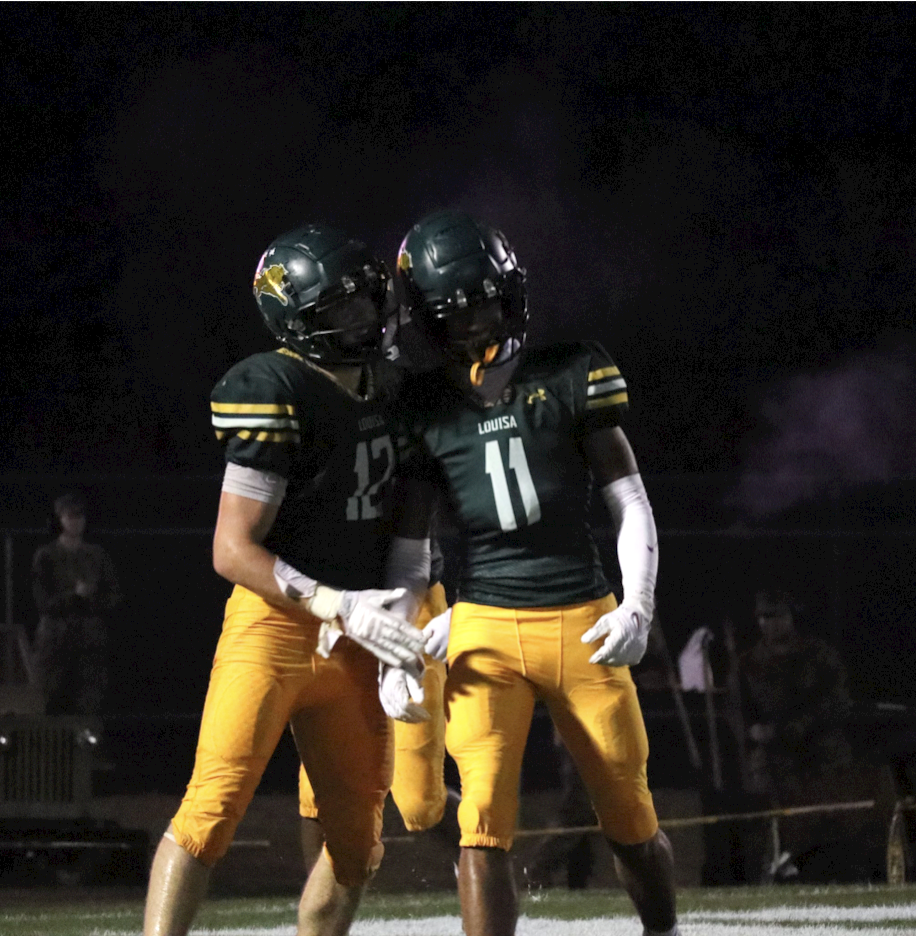 Senior Tye Tyson and Lonce celebrate after a touchdown.
