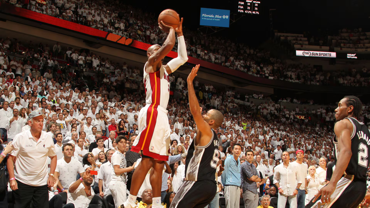 Ray Allen goes up over Tony Parker in a big moment in the NBA Finals. Courtesy of NBA.